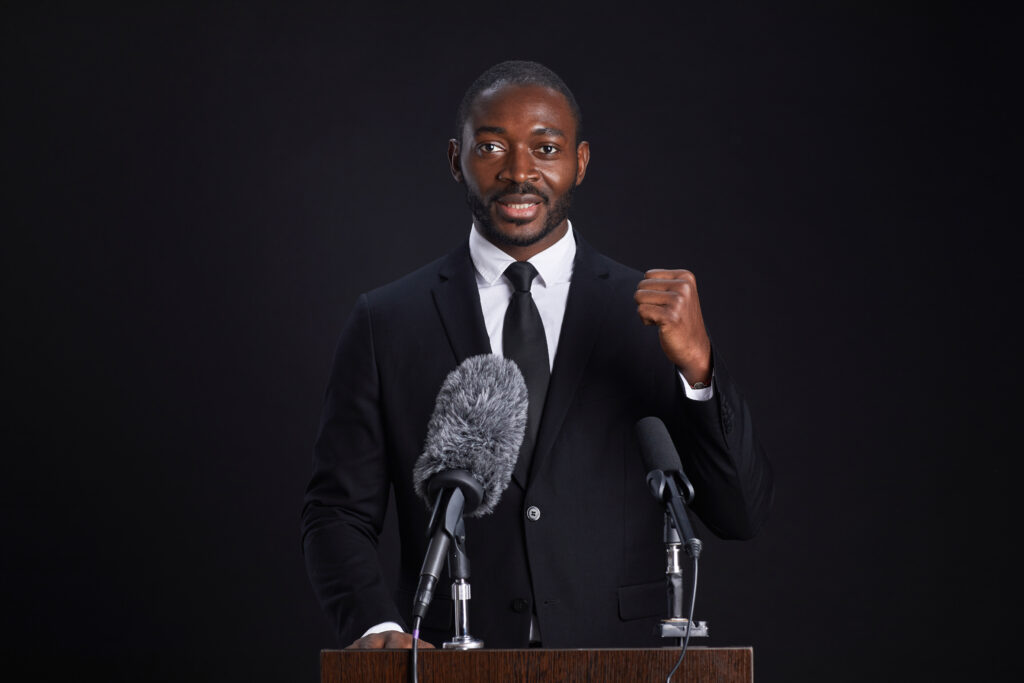 African-American Speaker at Podium